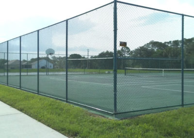 A chain fence covering a sports field